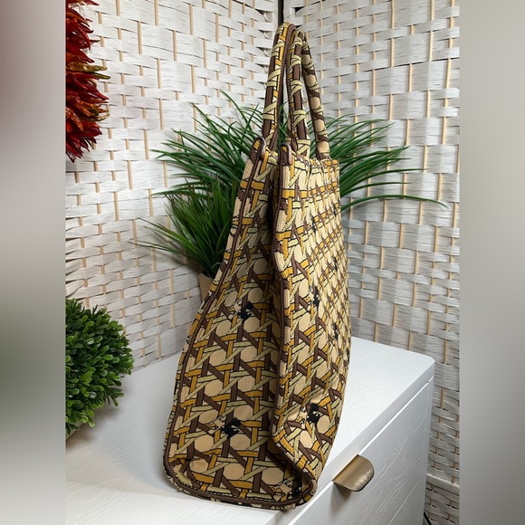 Tory Burch Ella Circular Knit Tote
Color: Tan Basketweave - Picture 12 of 13